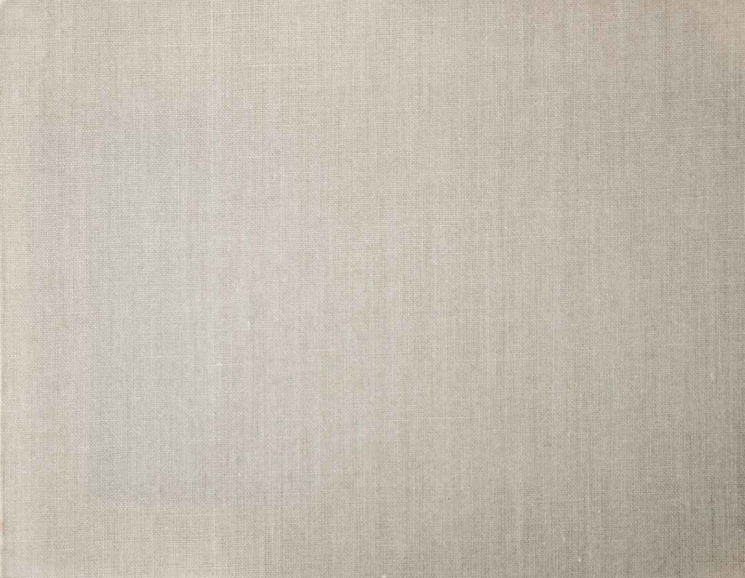 Beige linen texture placeholder by Annie Spratt / Unsplash; illustrative fabric image